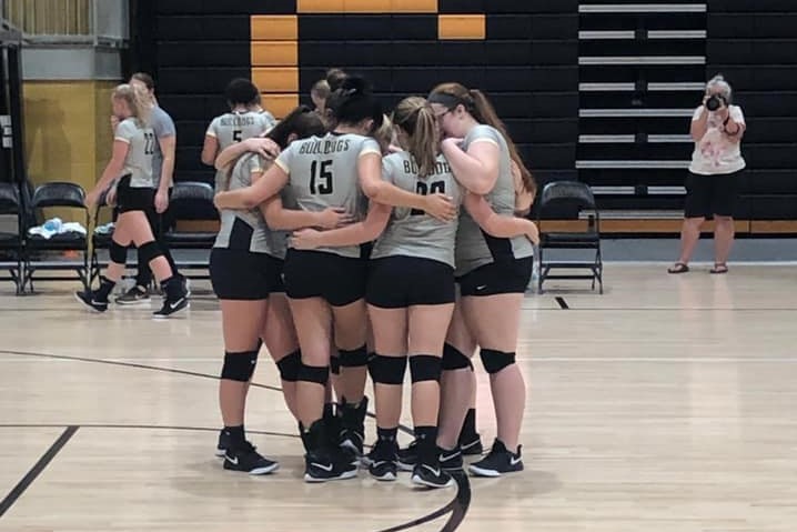 Varsity starters huddle up right before the start of their match.  October 7, 2019.