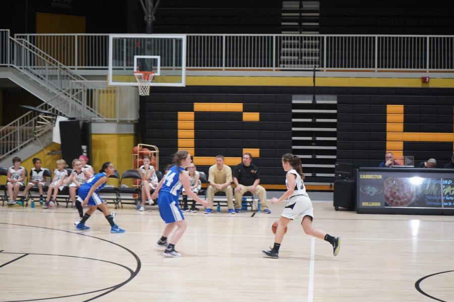 Seventh Grader Kylie Anastasiades brings the ball down the court during their victory against Cloverport. November 4, 2019.