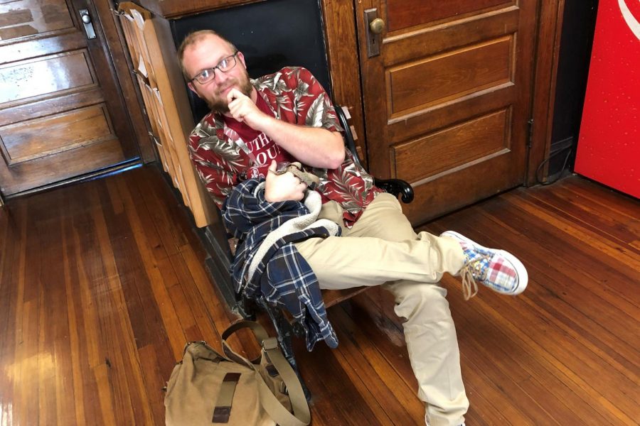 Mr. Parr is totally nailing the pattern-mixing trend - featuring his deep red tropical shirt with a green palm leaf print, and plaid shoes in coordinating colors.